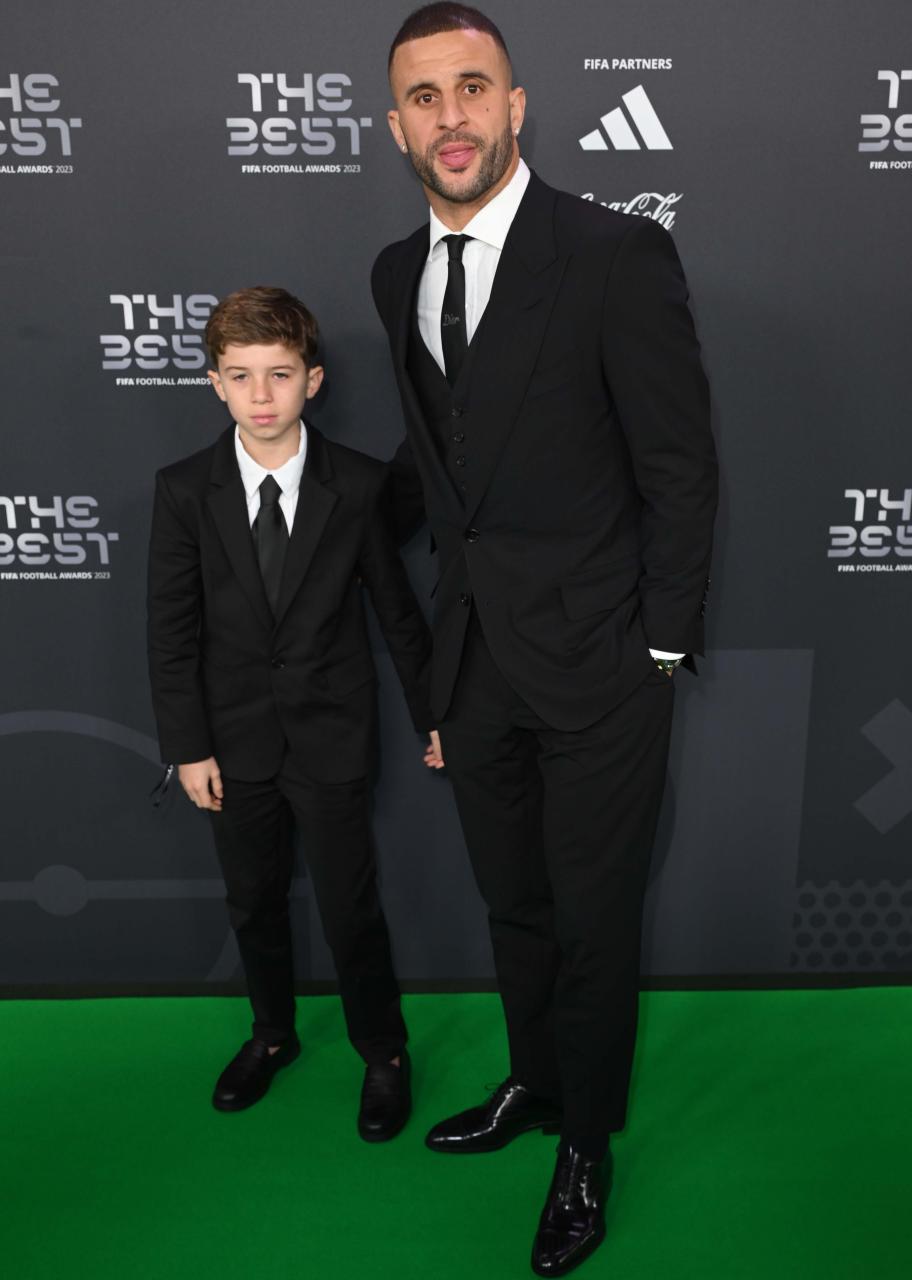 Kyle, 33, collected cases before father and son headed to last night's Fifa Best Awards in London