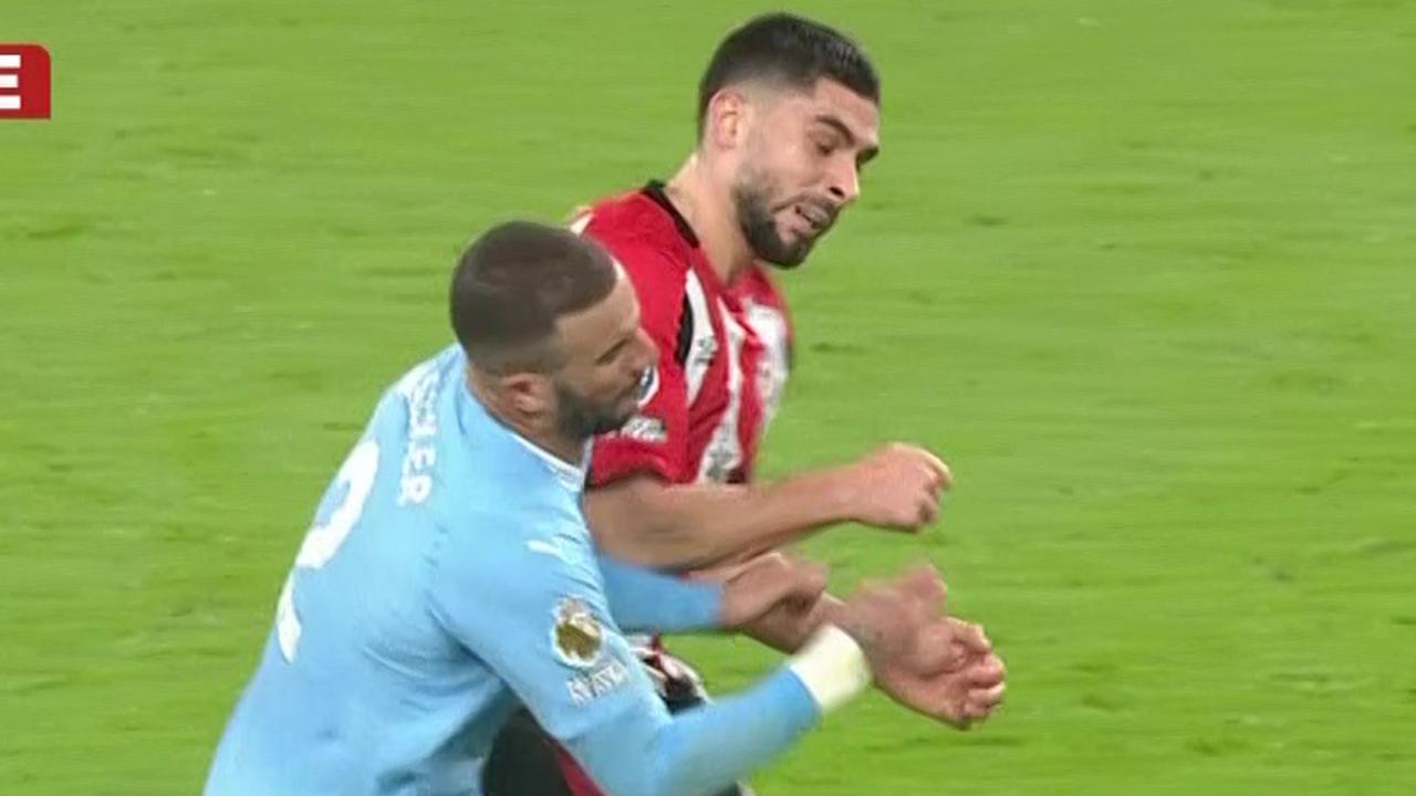 Kyle Walker booked for rash lunge on Neal Maupay just two weeks after pair's furious on-pitch bust-up | The Sun