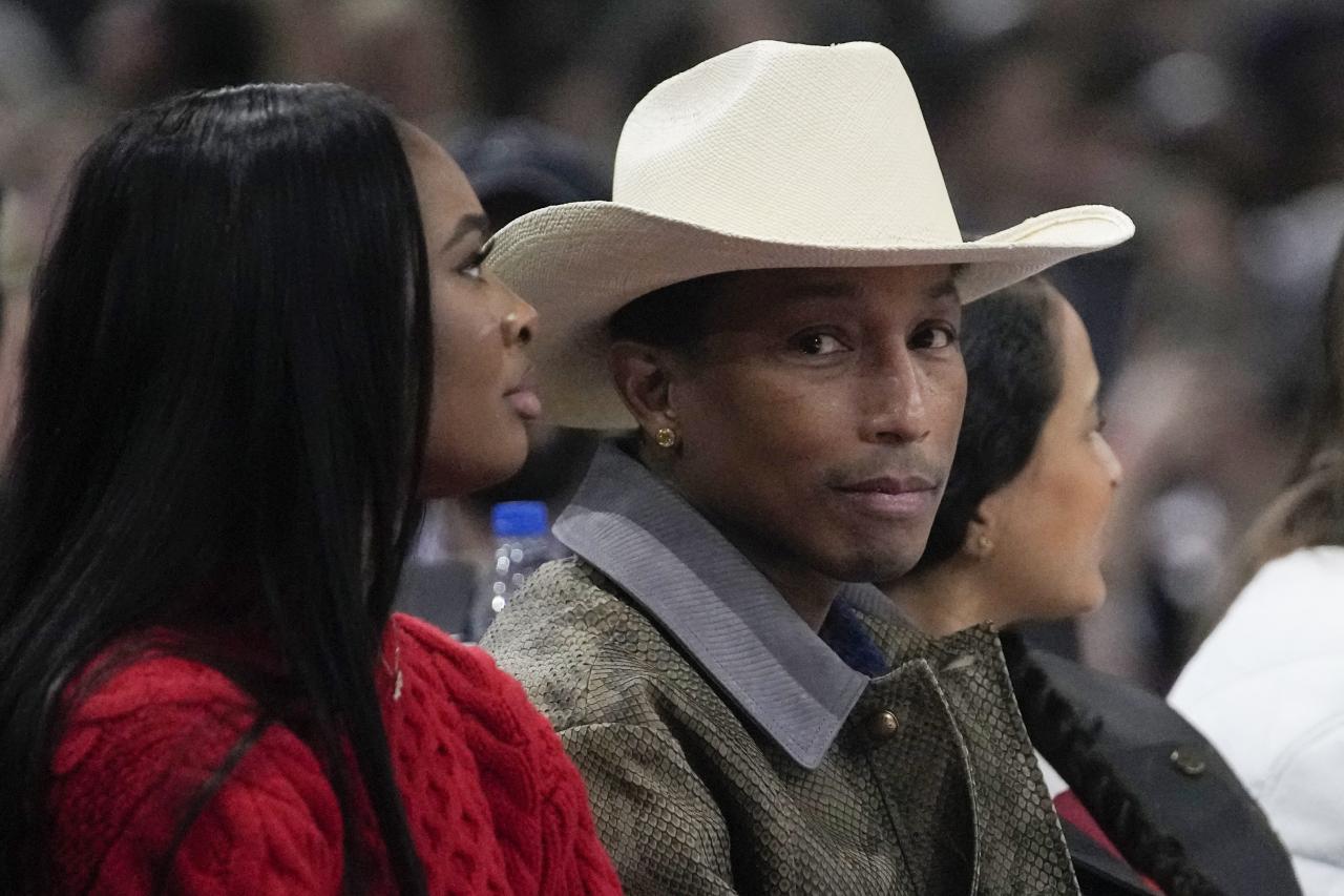 Pharrell Williams was also in attendance court side