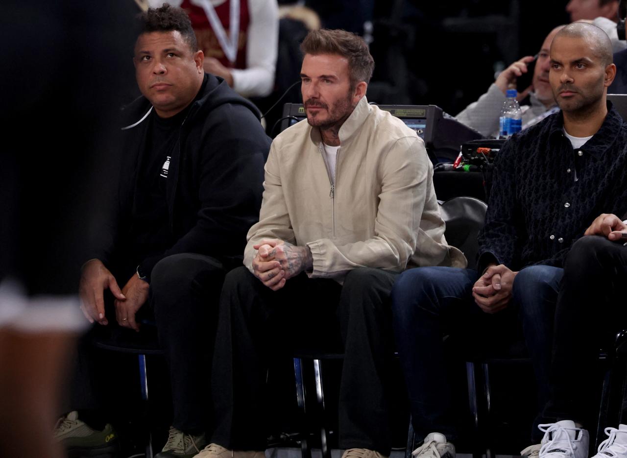 David Beckham sat alongside former Real Madrid team-mate Ronaldo and NBA legend Tony Parker