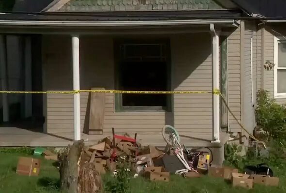 Police tape on a porch