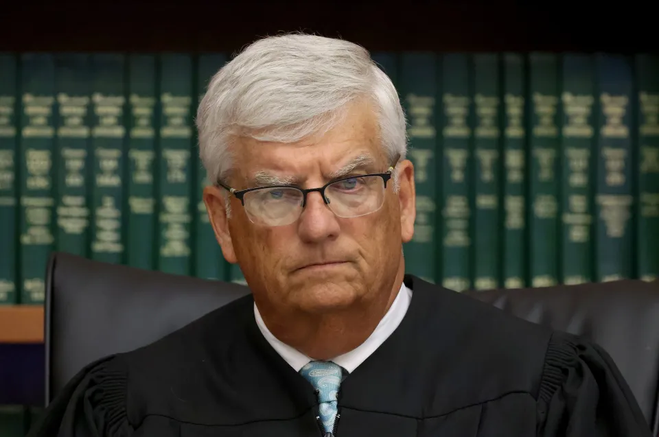 Judge William F. Sullivan listens during the Lindsay Clancy murder trial.