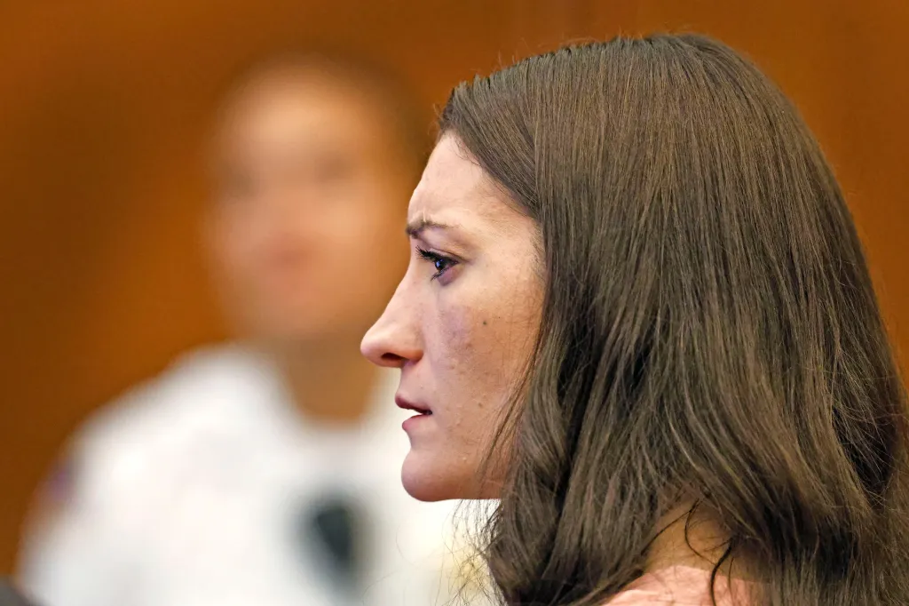 Lindsay Clancy watches her ex-husband Patrick Clancy at Plymouth Superior Court.