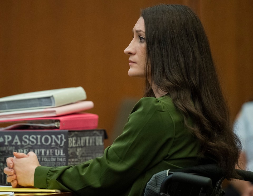Lindsay Clancy listens during her murder trial.