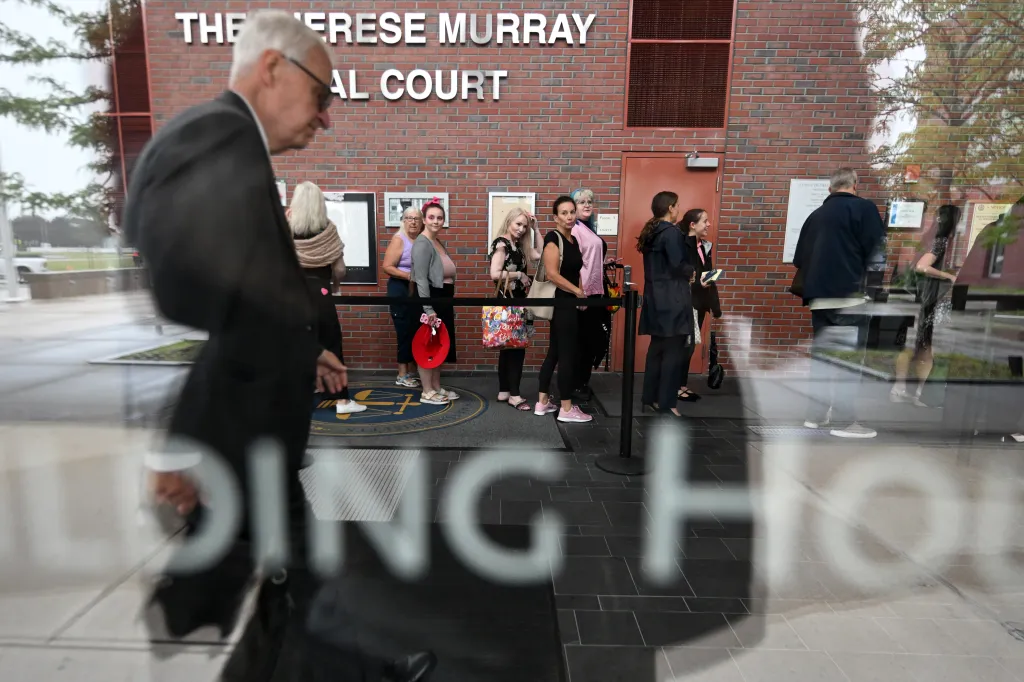 Supporters of Clancy enter Plymouth Superior Court on Friday, Aug. 21, 2026, in Plymouth, Mass.
