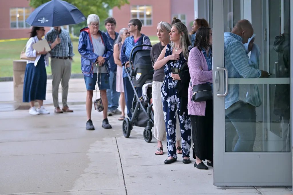 Supporters of Lindsay Clancy enter Plymouth Superior Court on Friday, Aug. 21, 2026, in Plymouth, Mass.
