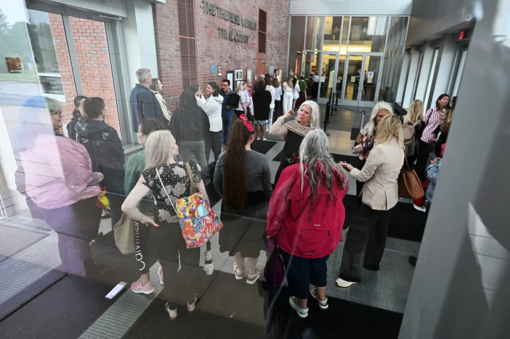 Supporters of Clancy enter Plymouth Superior Court on Friday, Aug. 21, 2026, in Plymouth, Mass.