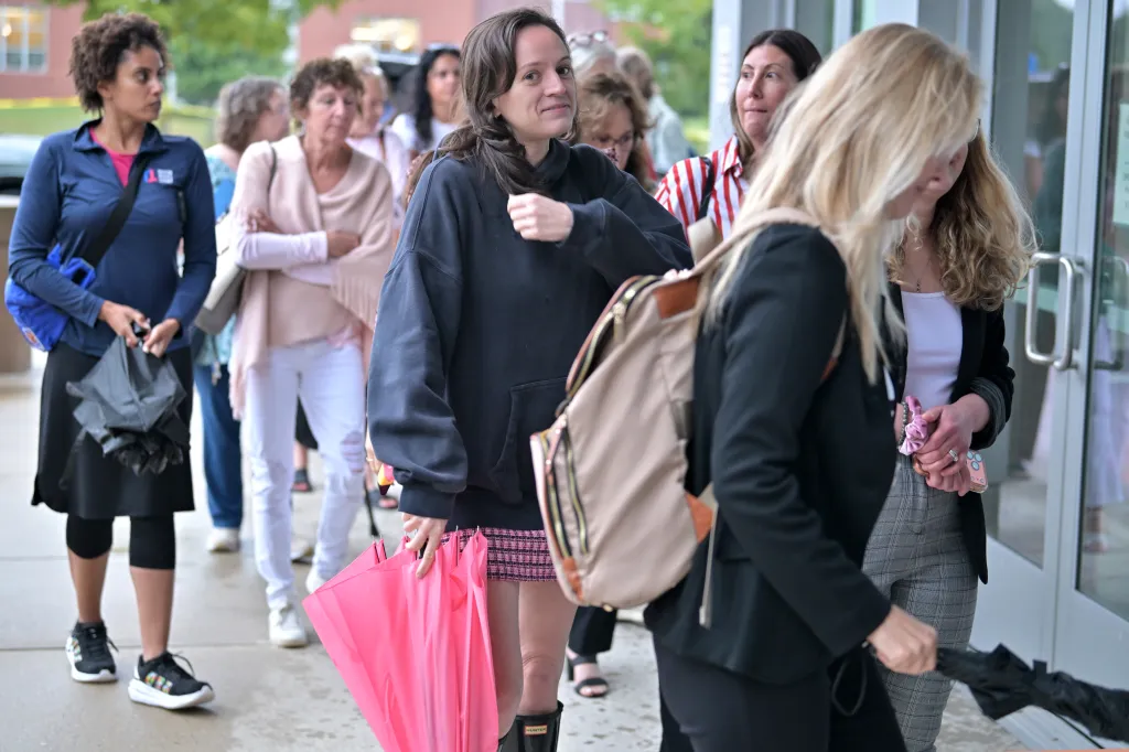 Supporters of Lindsay Clancy enter Plymouth Superior Court on Friday, Aug. 21, 2026, in Plymouth, Mass.