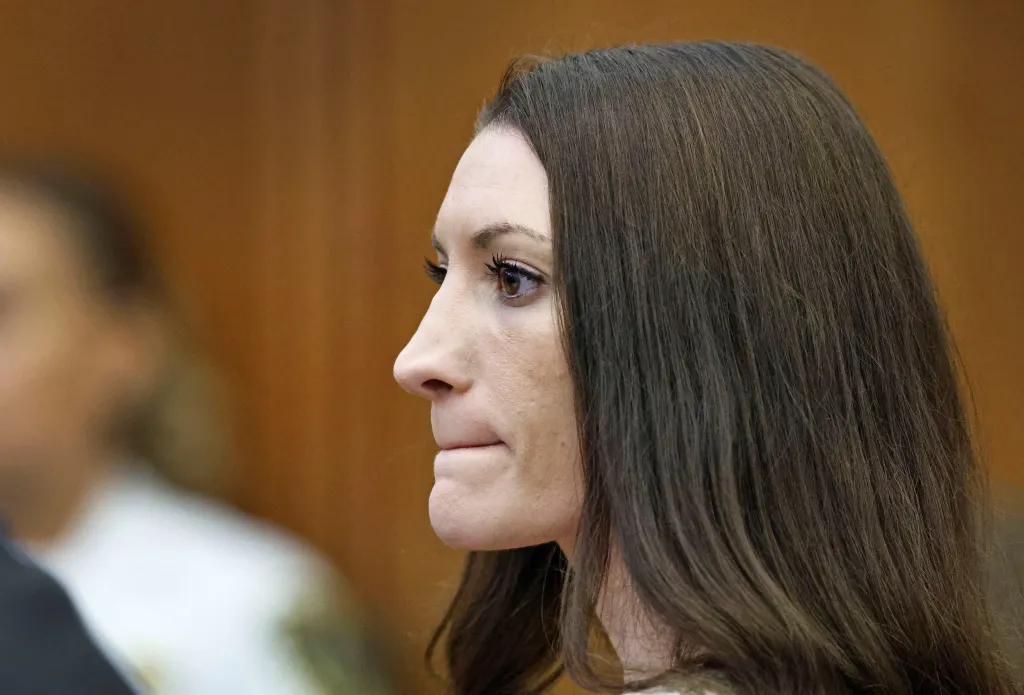Lindsey Clancy listens to the testimony of Dr. Gregory Saathoff.