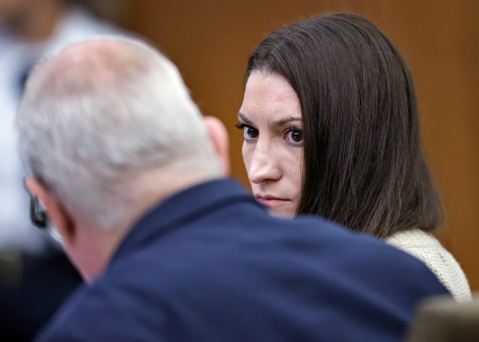 Lindsay Clancy talks with her lawyer Kevin Reddington during her murder trial.