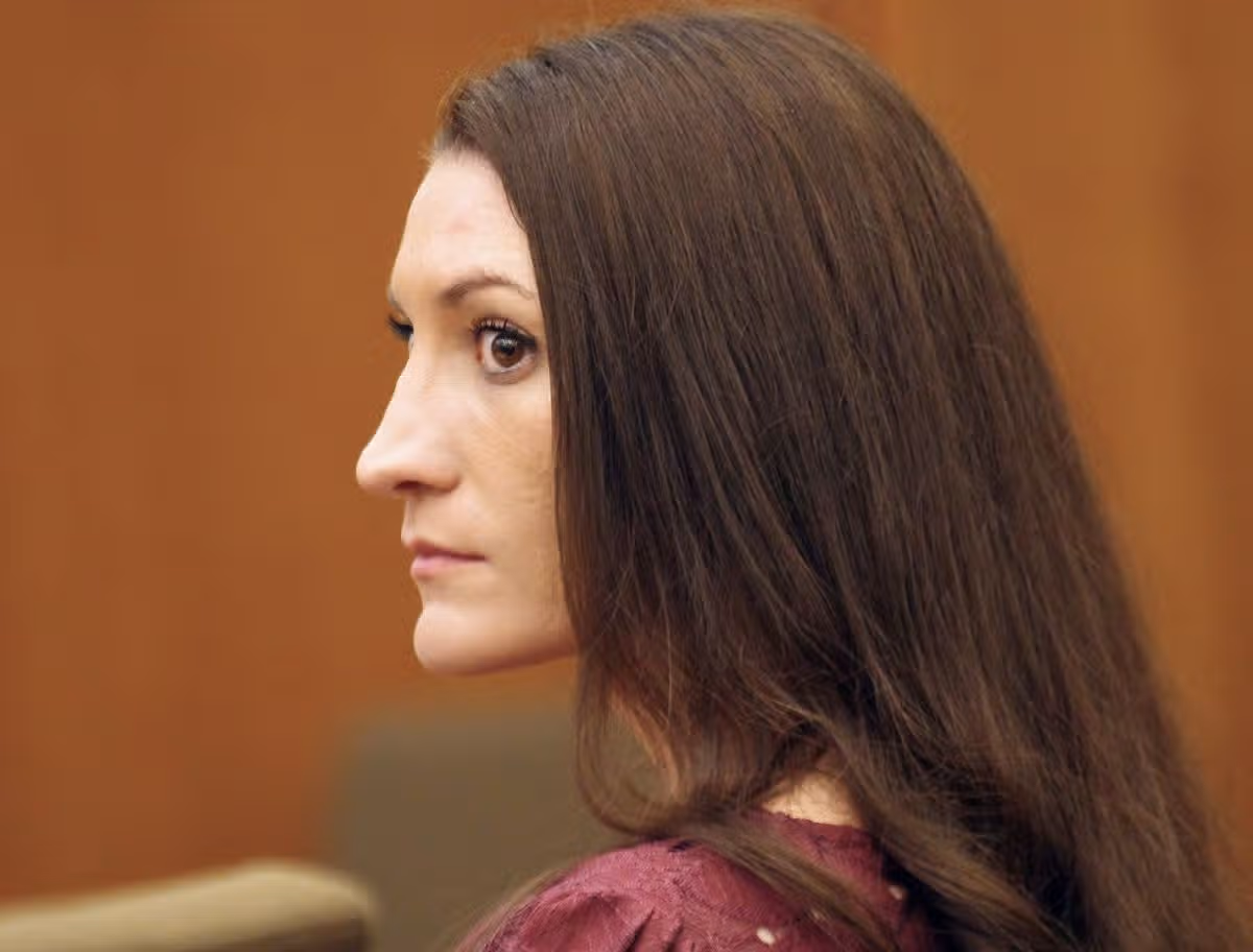 Defendant Lindsay Clancy watches as her attorney Kevin Reddington prepares to interview a witness during proceedings in her murder trial, Friday, Aug. 21, 2026, in Plymouth, Mass. (Mark Chavous /The Enterprise via AP, Pool)