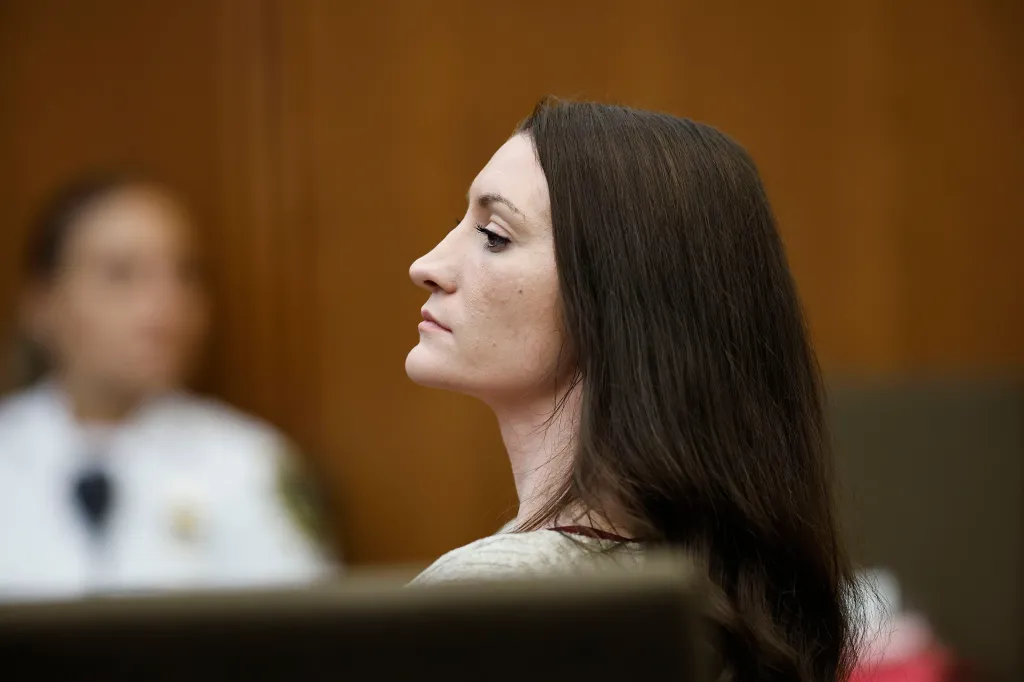 Lindsay Clancy in a wheelchair in court during her murder trial.