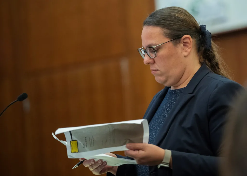 Prosecutor Shanan Buckingham reads evidence during Lindsay Clancy's murder trial.