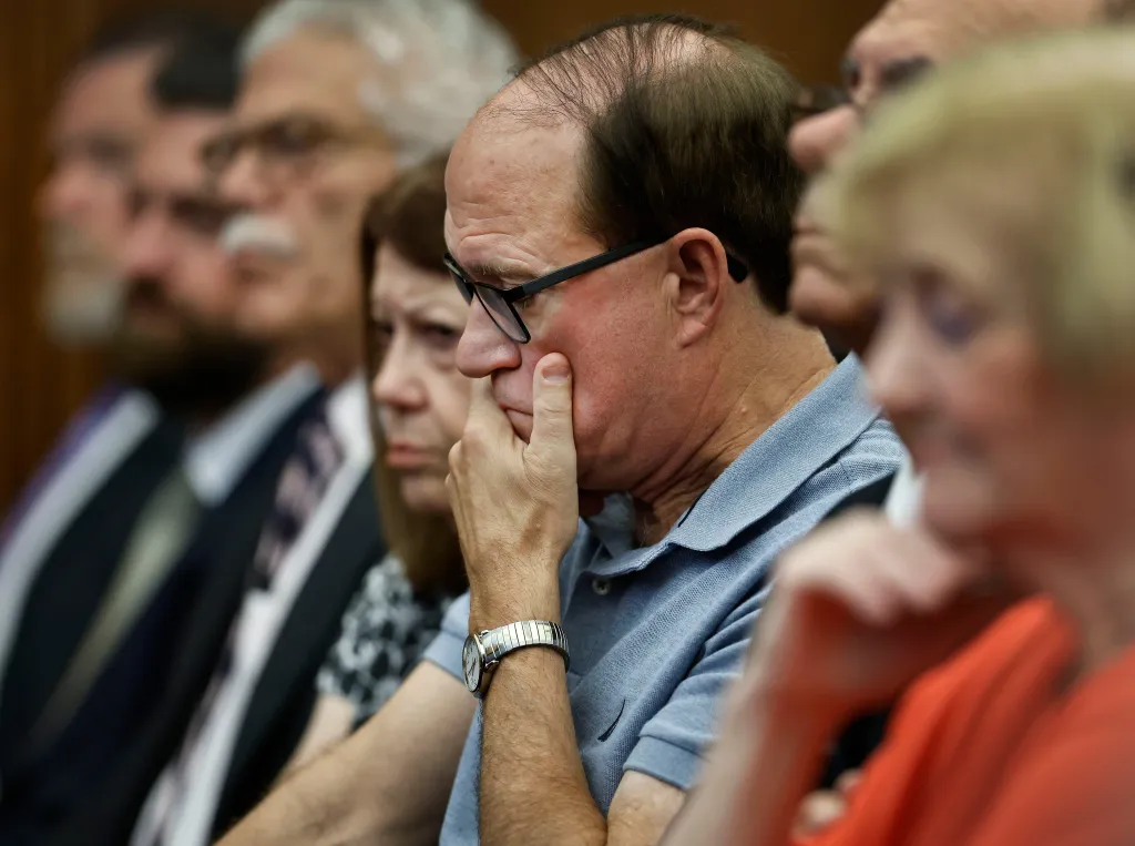 Michael Musgrove, father of Lindsay Clancy, listens to testimony at his daughter's murder trial.