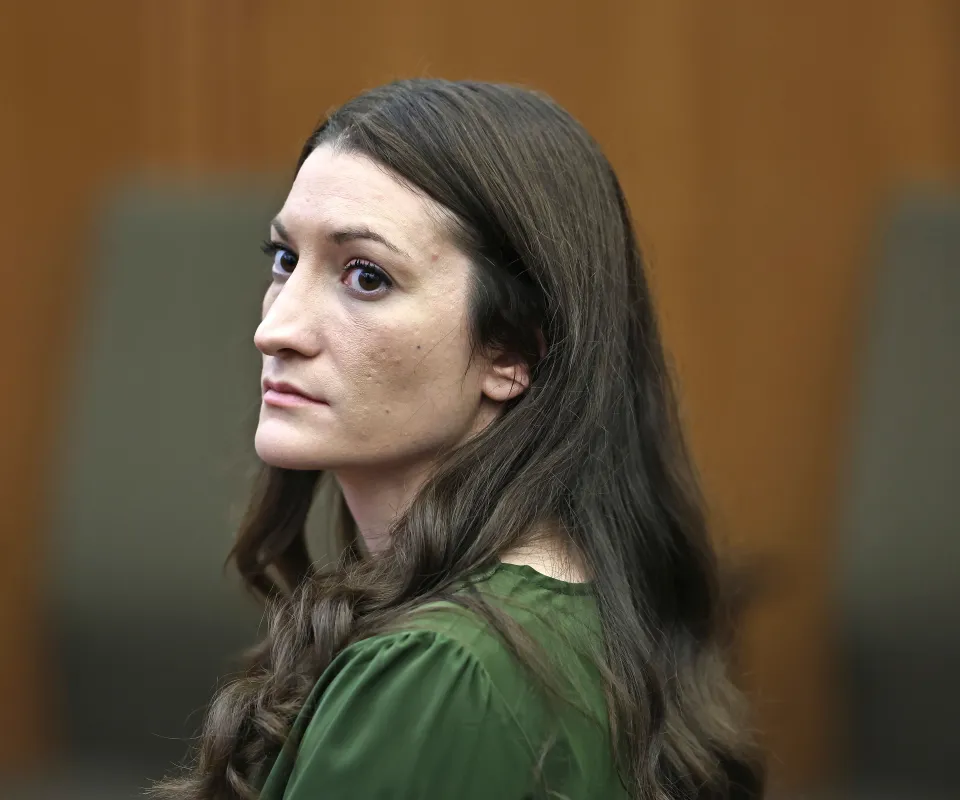 Lindsay Clancy watching jury members during her murder trial.