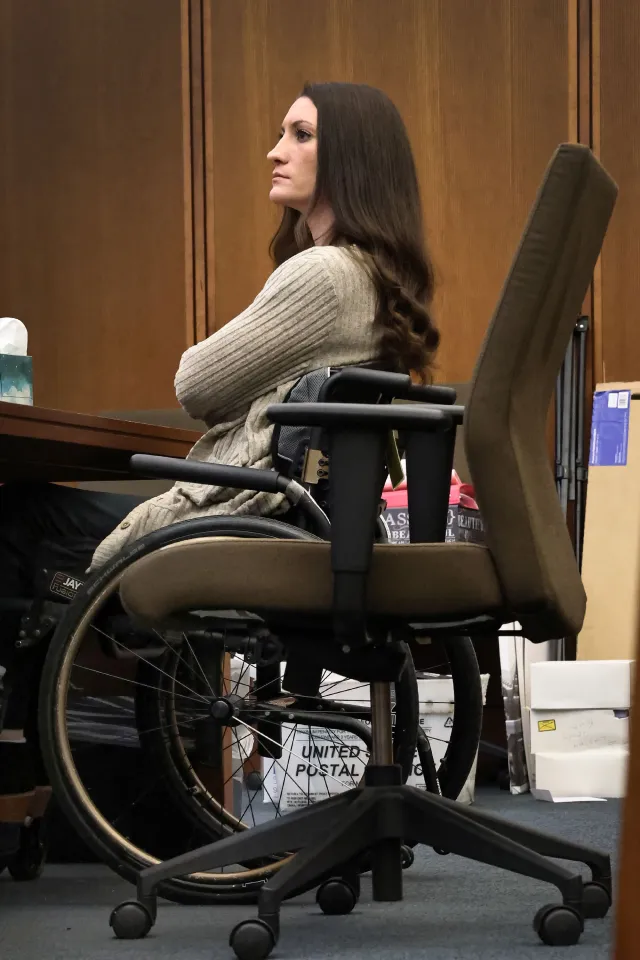 Lindsay Clancy in a wheelchair during her trial.