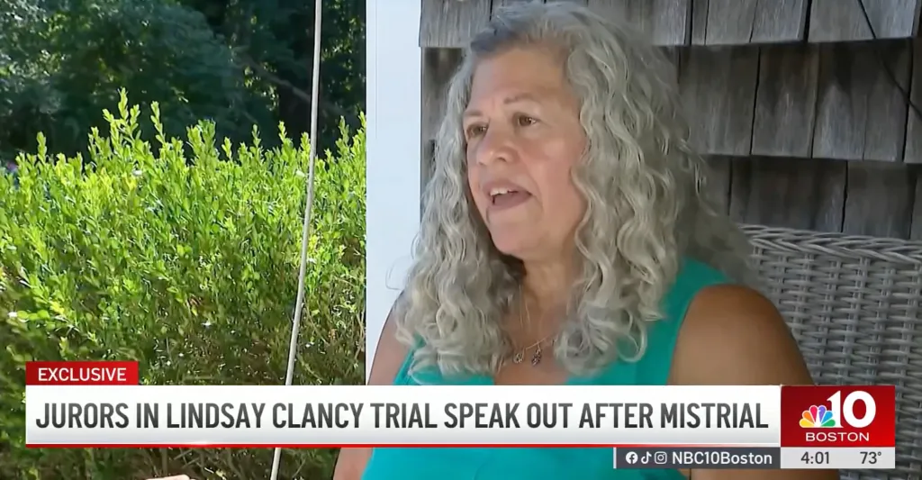A woman with curly gray hair speaks, wearing a teal top and a necklace with small charms. Text overlay reads "EXCLUSIVE JURORS IN LINDSAY CLANCY TRIAL SPEAK OUT AFTER MISTRIAL."