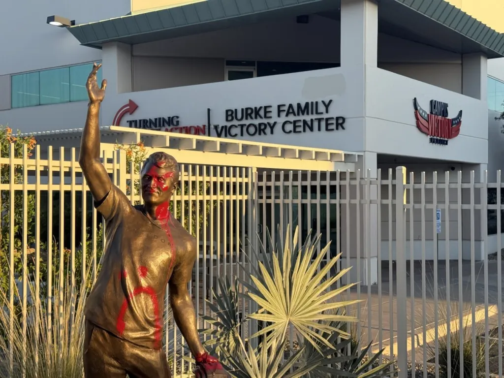 A statue of Charlie Kirk at Turning Point USA's headquarters near 48th Street and Baseline Road in Phoenix was vandalized on Sept. 13, 2026. The eight-foot statue was installed to mark the one-year anniversary of Kirk's killing.