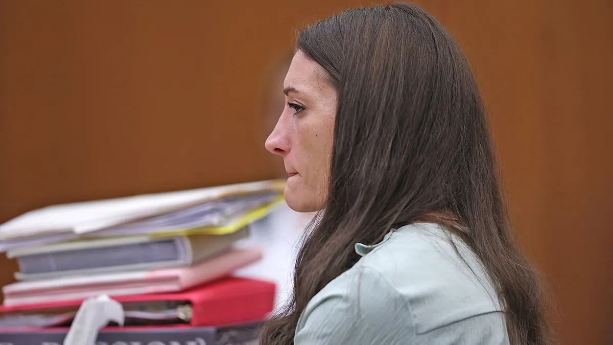 Lindsay Clancy cries during trial.