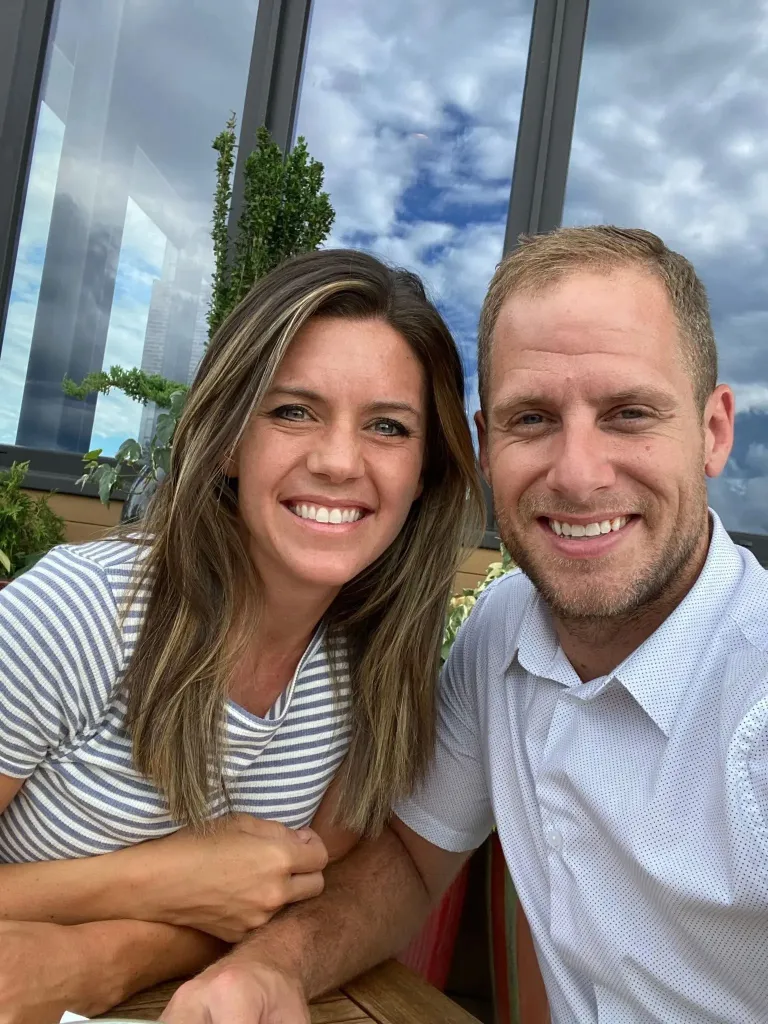 Caleb Flynn and his wife Ashley Flynn smiling together in undated selfie image