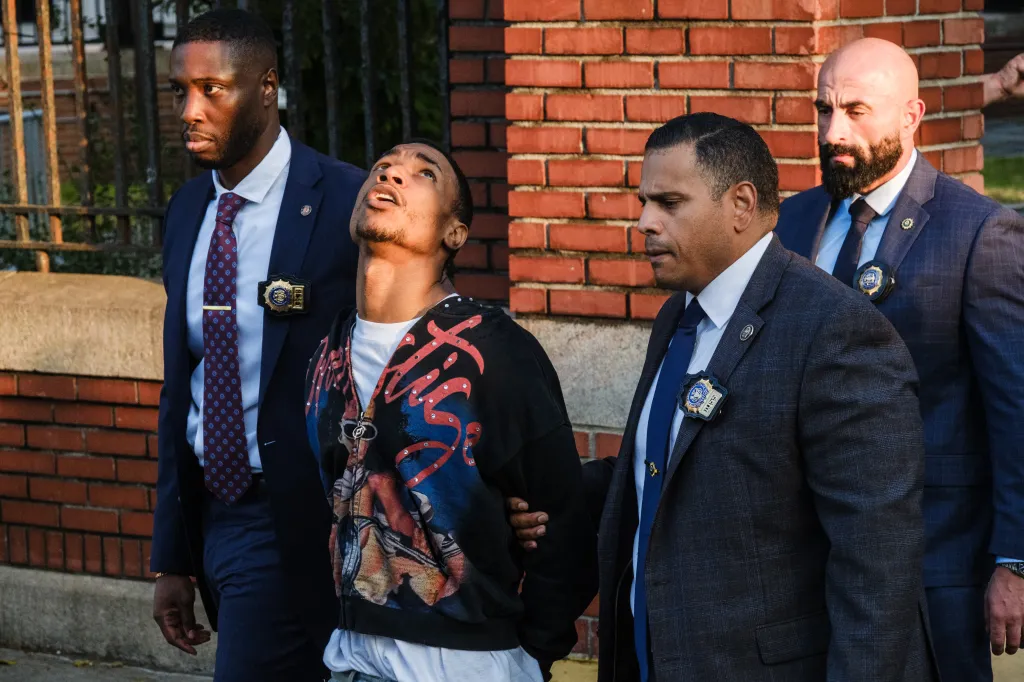 Dangelo Caraballo being transported by NYPD detectives from the 52nd precinct in the Bronx.