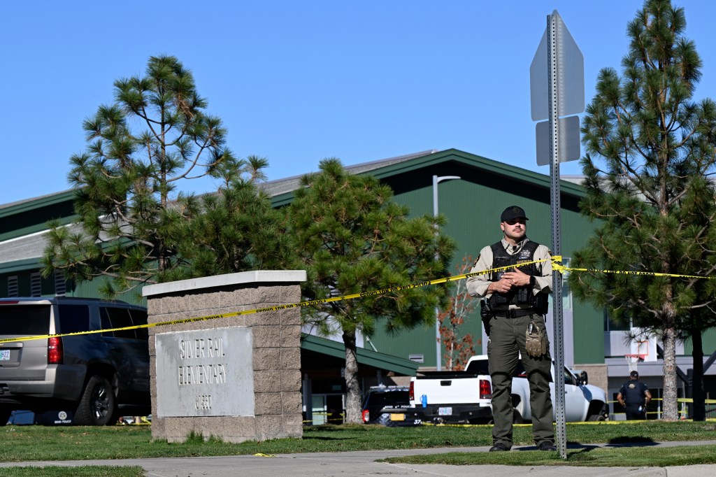 Police tape is placed outside Silver Rail Elementary school in Bend, Ore.