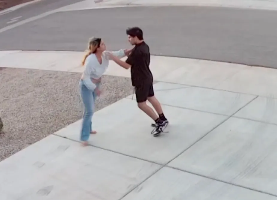 Bella Torres fighting off an intruder on her driveway.