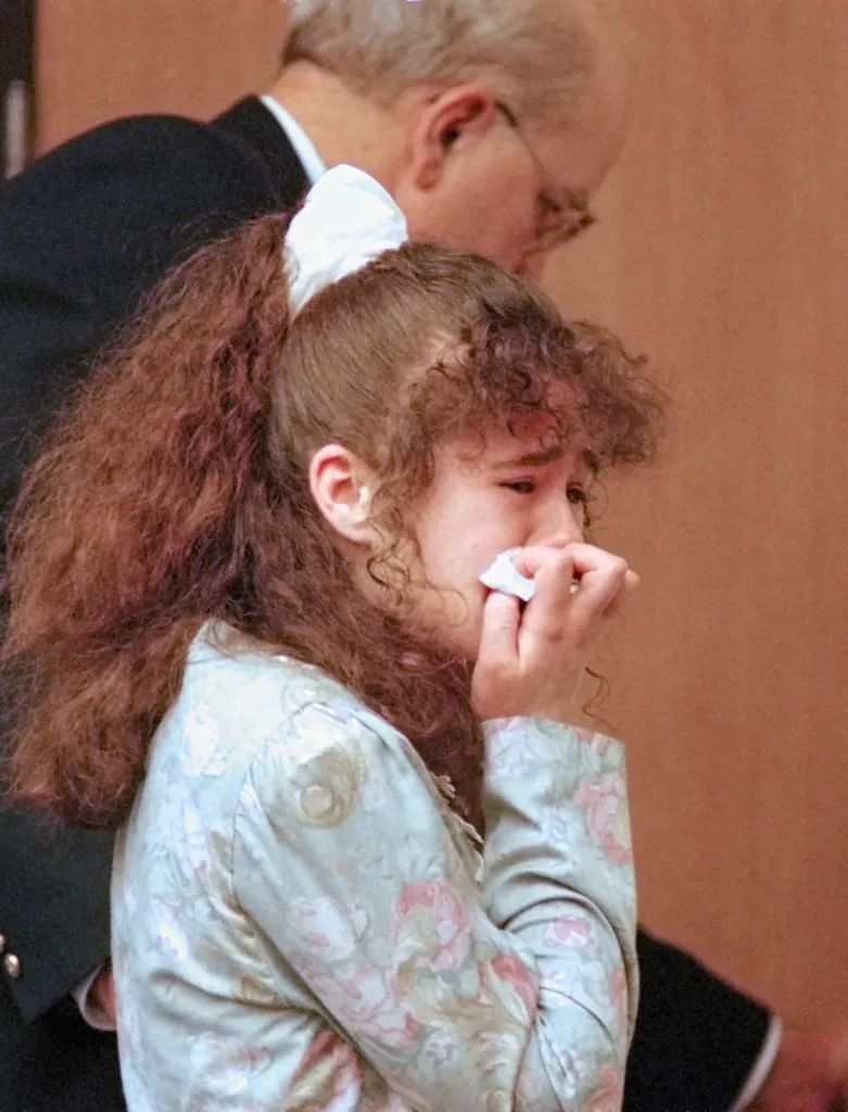 Christa Pike is escorted from Knox County Criminal Court in Knoxville, Tennessee.
