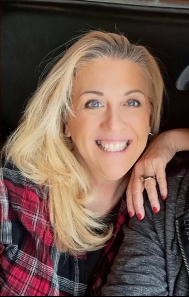 Teacher Becky Drury smiling.