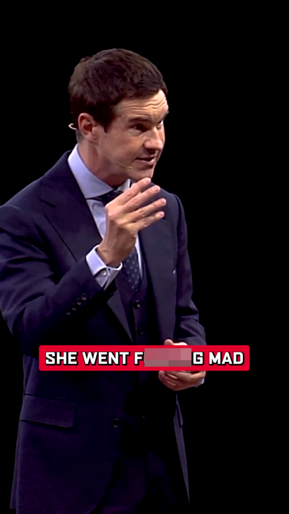 Jimmy Carr in a suit on stage, with a caption reading "SHE WENT F***ING MAD".