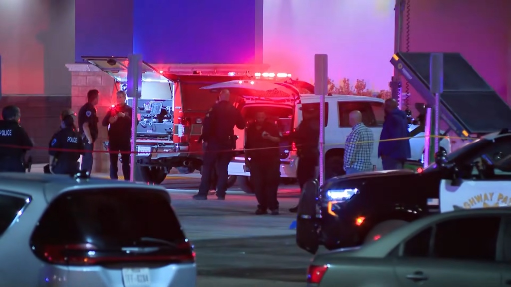 Emergency response vehicles and personnel at the scene of a shooting at Solano Town Center in Fairfield, California.