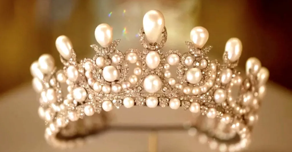 A tiara adorned with pearls worn by French Empress Eugenie on display at the Louvre Museum.