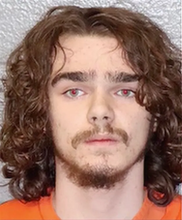 Booking photo of one of the teens.